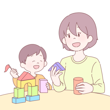 積み木で遊ぶお母さんと子供