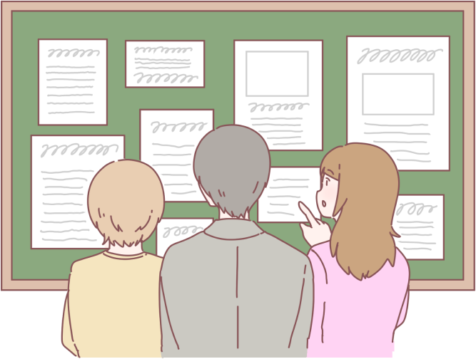 掲示板を眺める人達